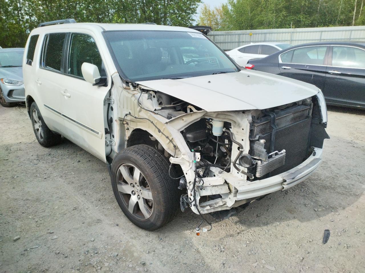 Photo 14 from auction – 2013 HONDA PILOT TOUR with VIN 5FNYF4H98DB012786