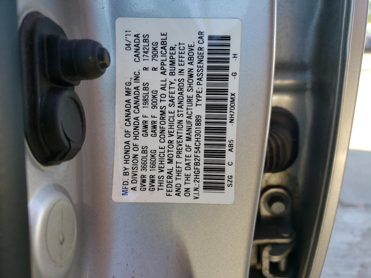 Photo 11 from auction – 2012 HONDA CIVIC LX with VIN 2HGFB2F54CH301889