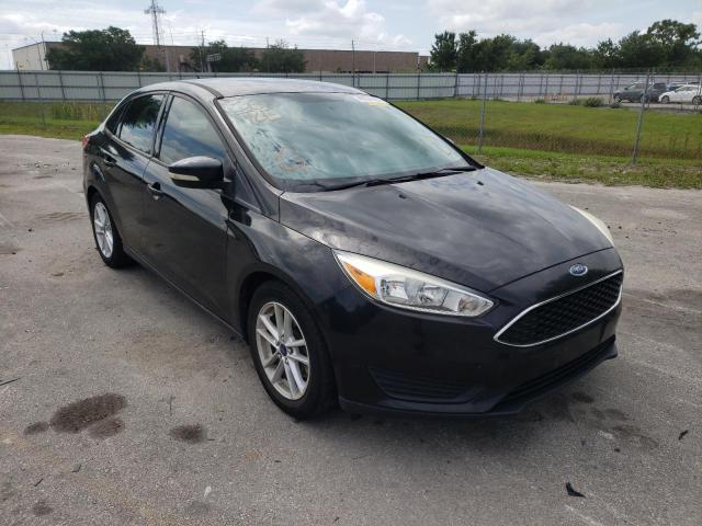 FORD FOCUS SE 2015 with VIN 1FADP3F2XFL215468 - Photo from auction