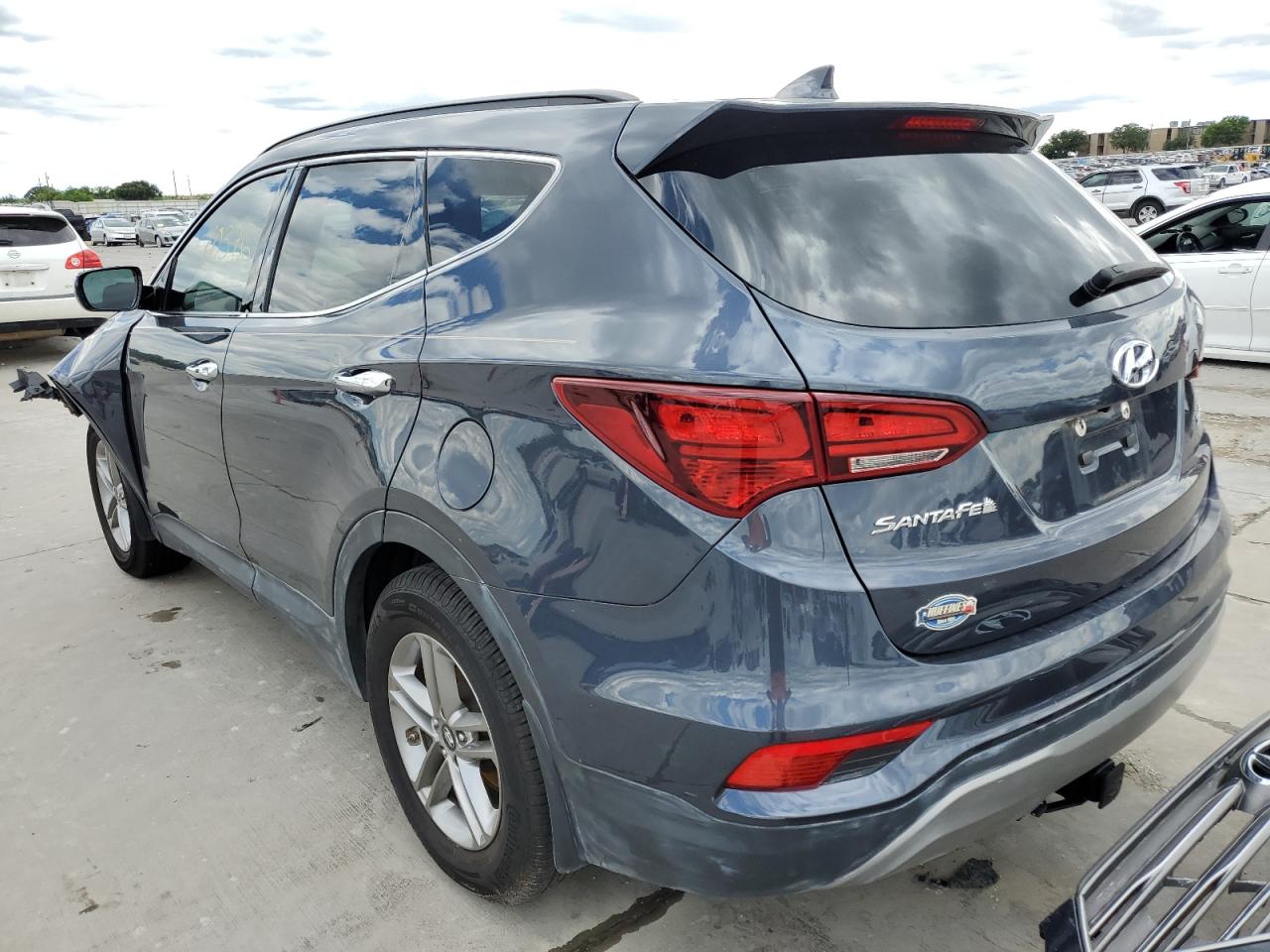 Photo 3 from auction – 2017 HYUNDAI SANTA FE S with VIN 5NMZU3LB1HH025365