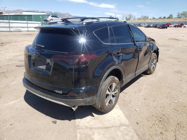 Photo 4 from auction – 2016 TOYOTA RAV4 XLE with VIN 2T3RFREV9GW465414