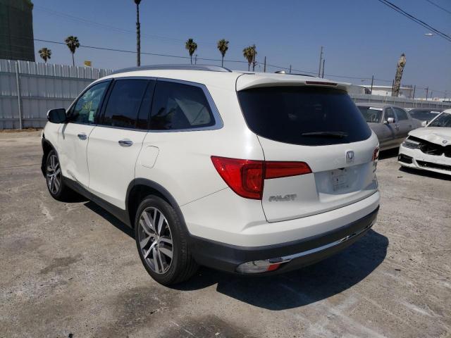 Photo 3 from auction – 2017 HONDA PILOT TOUR with VIN 5FNYF5H9XHB033649