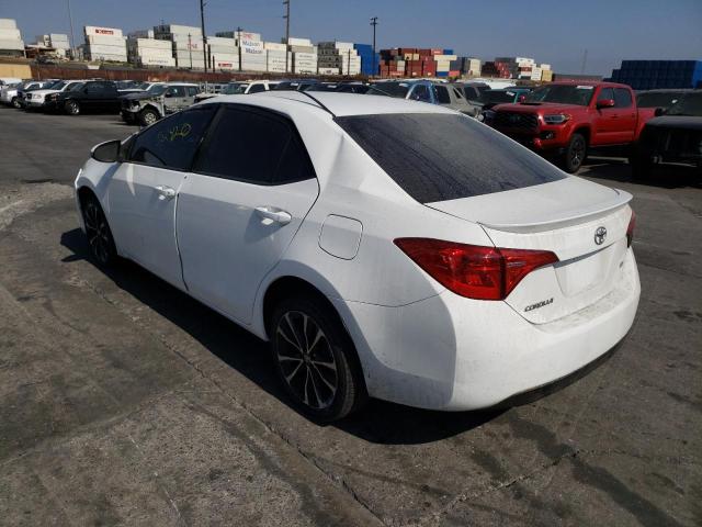 Photo 3 from auction – 2018 TOYOTA COROLLA L with VIN 5YFBURHEXJP763877