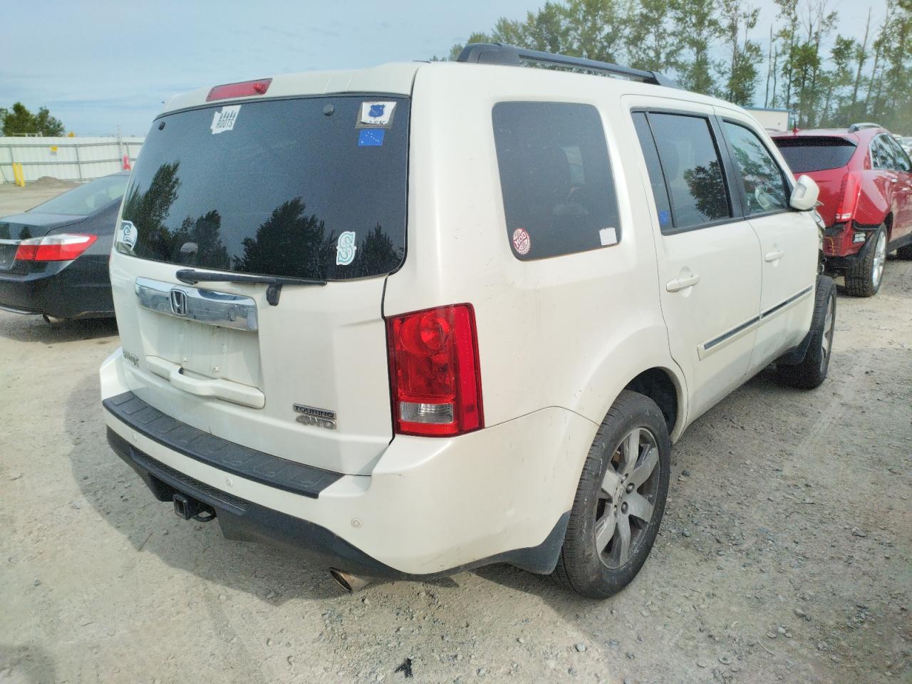Photo 17 from auction – 2013 HONDA PILOT TOUR with VIN 5FNYF4H98DB012786