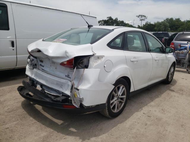 Photo 4 from auction – 2016 FORD FOCUS SE with VIN 1FADP3F21GL290917