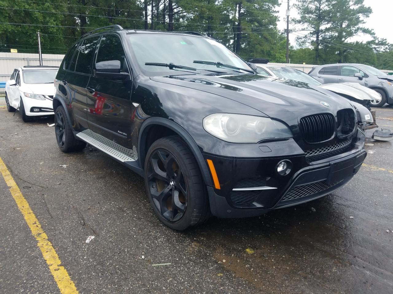 BMW X5 XDRIVE3 2011 with VIN 5UXZV4C58BLL58132 - Photo from auction