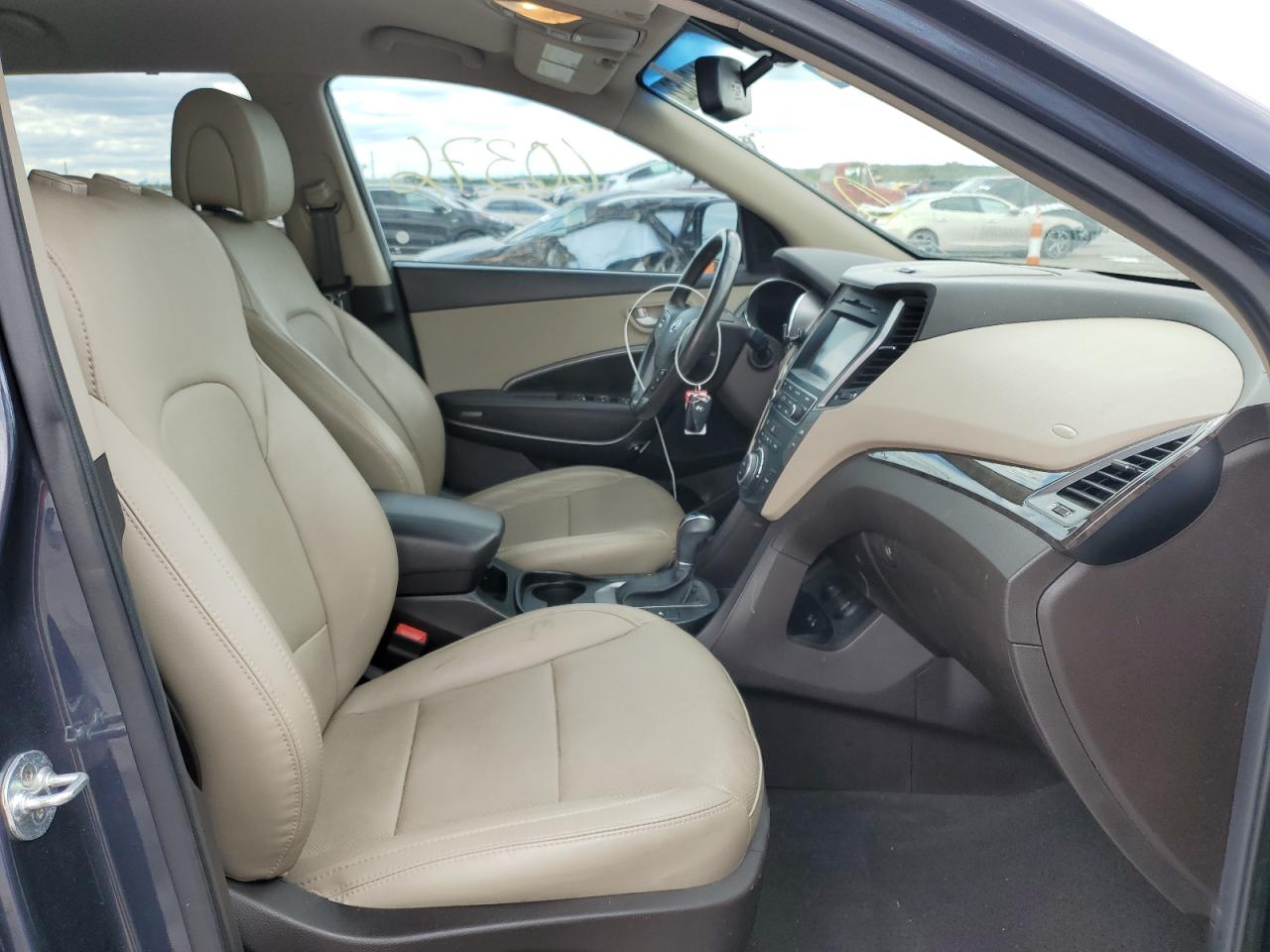 Photo 5 from auction – 2017 HYUNDAI SANTA FE S with VIN 5NMZU3LB1HH025365