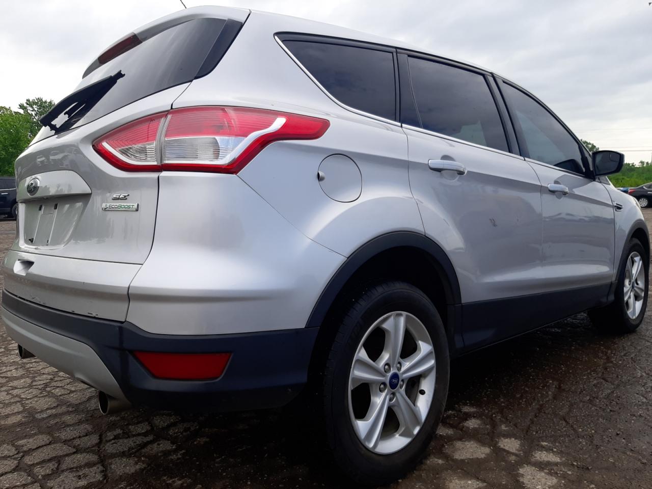 Photo 4 from auction – 2013 FORD ESCAPE SE with VIN 1FMCU0GX2DUB97929
