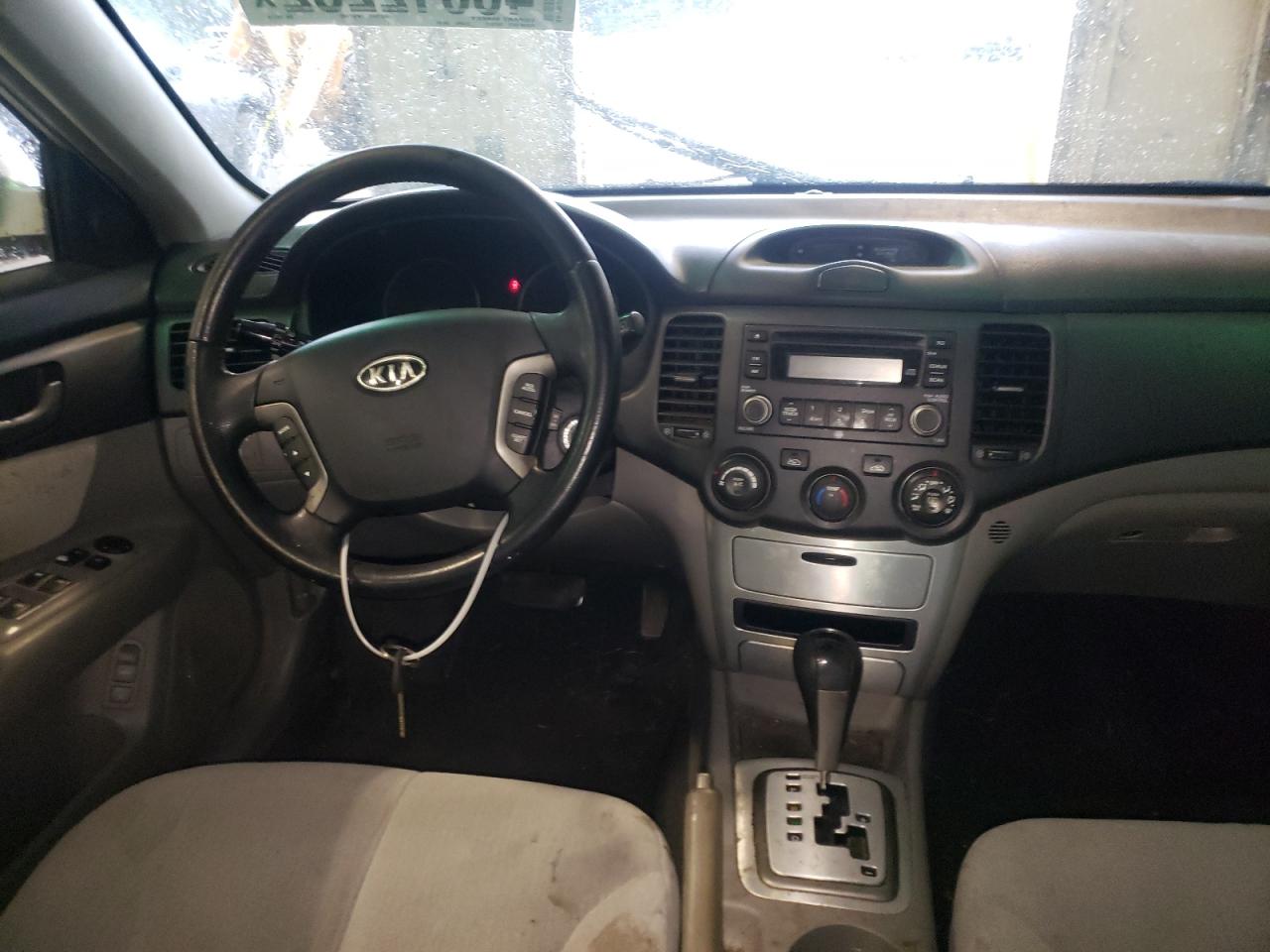 Photo 9 from auction – 2008 KIA OPTIMA LX with VIN KNAGE123285242779