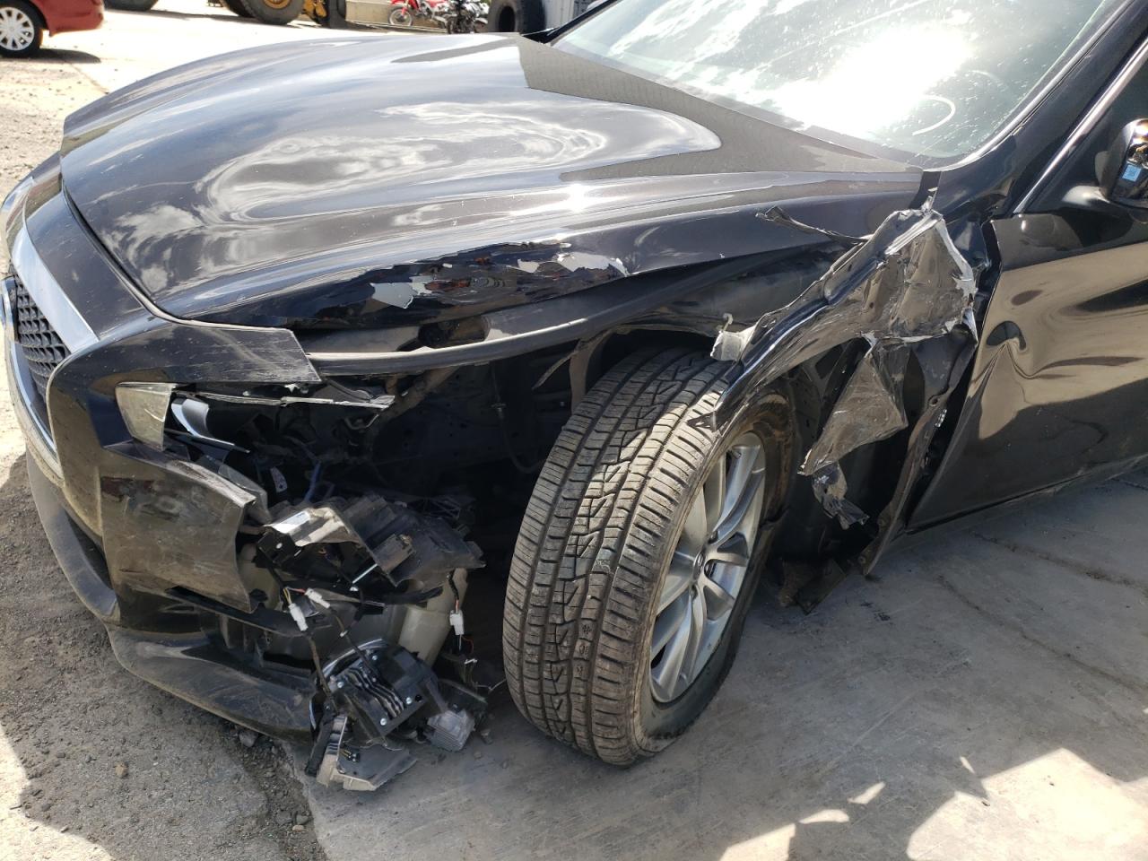 Photo 19 from auction – 2014 INFINITI Q50 BASE with VIN JN1BV7AR3EM699417