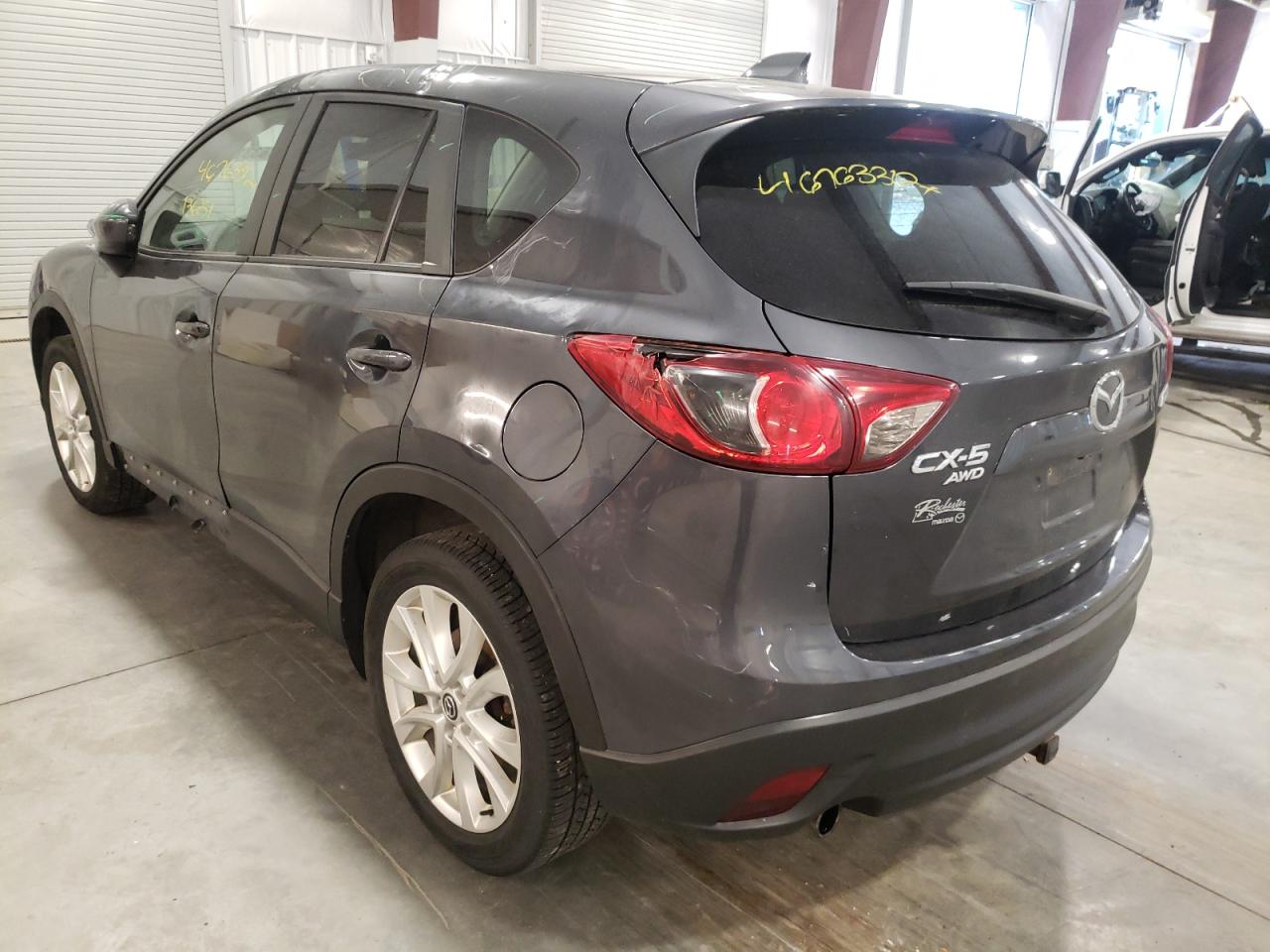 Photo 3 from auction – 2014 MAZDA CX-5 GT with VIN JM3KE4DY6E0348904