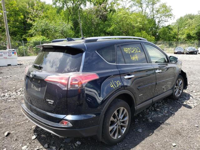 Photo 4 from auction – 2018 TOYOTA RAV4 LIMIT with VIN JTMDFREV2JJ725927
