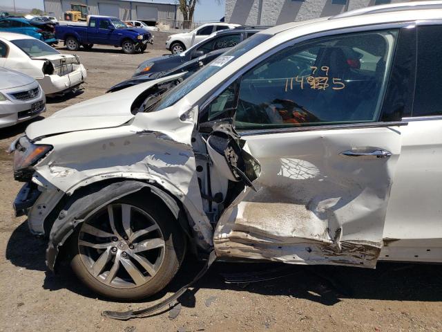 Photo 9 from auction – 2016 HONDA PILOT ELIT with VIN 5FNYF6H04GB076244
