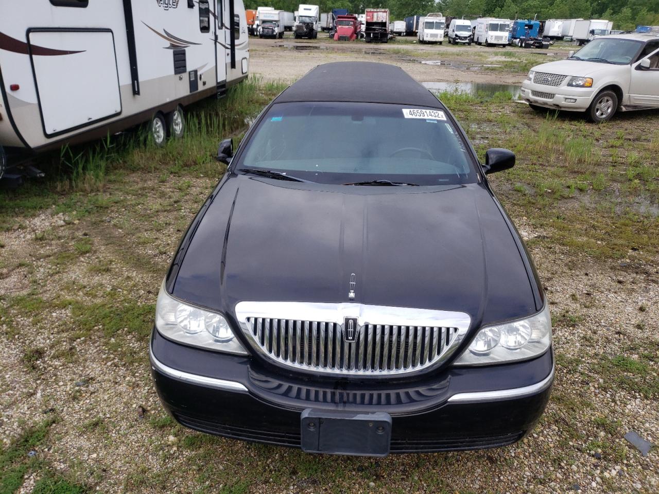 Photo 9 from auction – 2011 LINCOLN TOWN CAR E with VIN 2L1FL8JW1BX751256