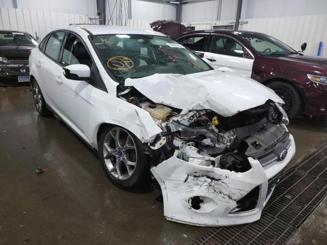 FORD FOCUS SE 2014 with VIN 1FADP3F2XEL337729 - Photo from auction