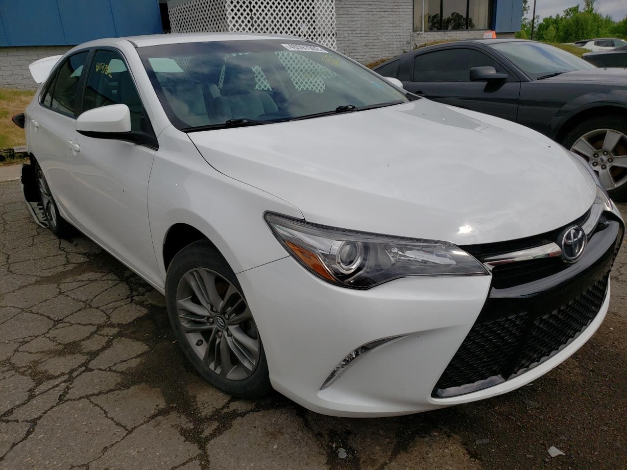 TOYOTA CAMRY LE 2017 with VIN 4T1BF1FK1HU770665 - Photo from auction