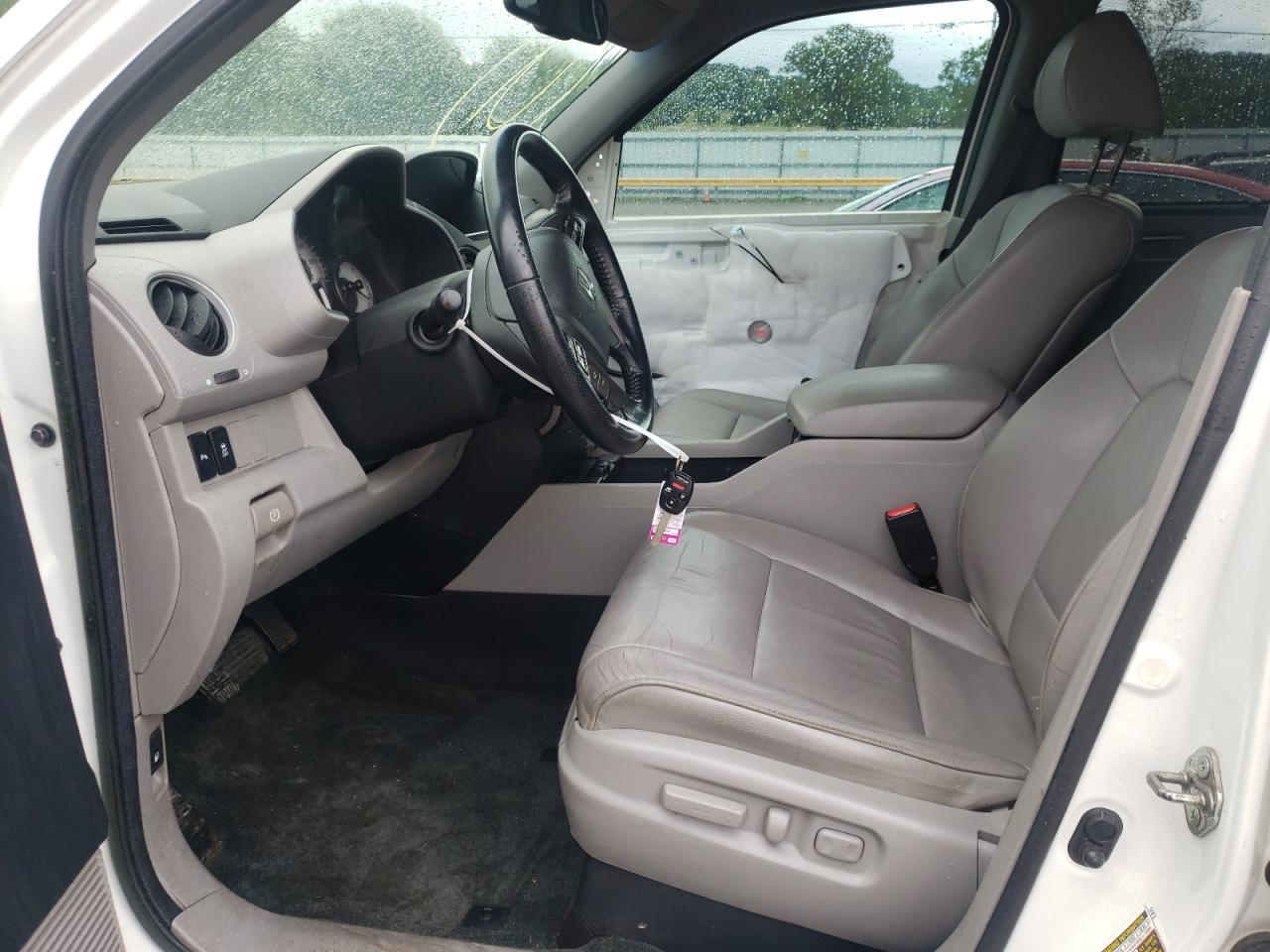 Photo 19 from auction – 2014 HONDA PILOT TOUR with VIN 5FNYF3H95EB007797
