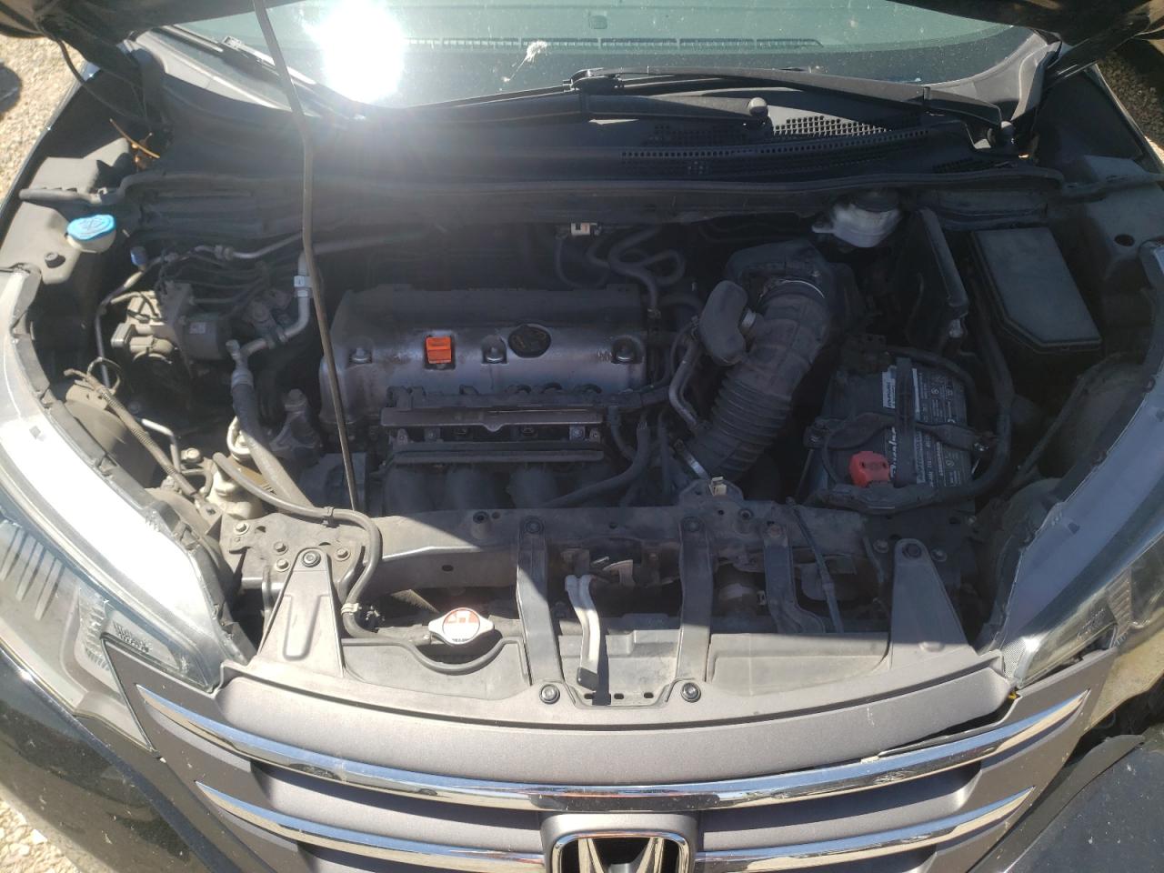 Photo 12 from auction – 2014 HONDA CR-V LX with VIN 2HKRM4H33EH680178