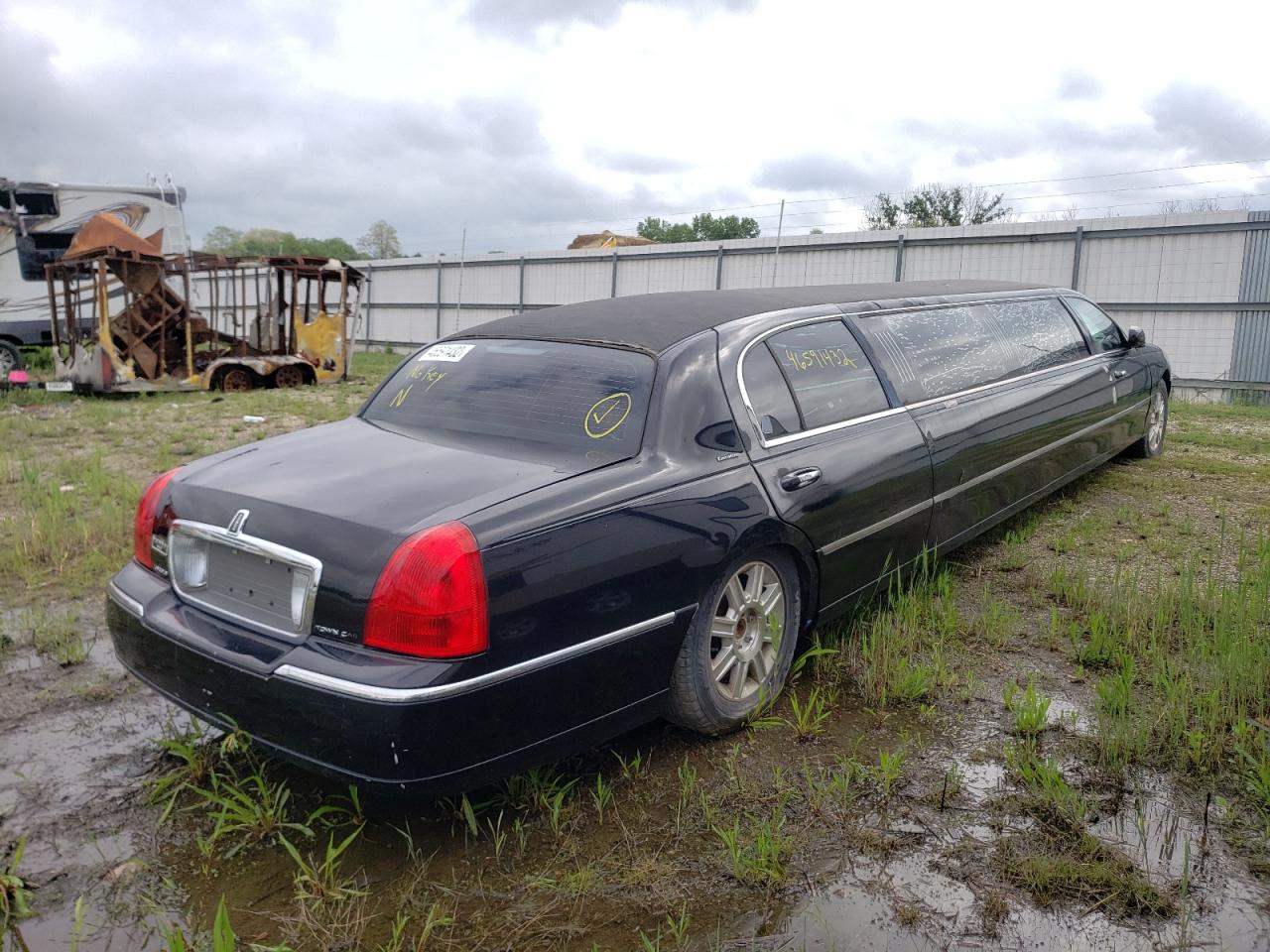Photo 4 from auction – 2011 LINCOLN TOWN CAR E with VIN 2L1FL8JW1BX751256
