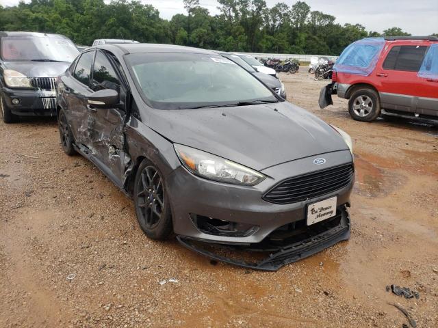 FORD FOCUS 2016 with VIN 1FADP3FE3GL318288 - Photo from auction
