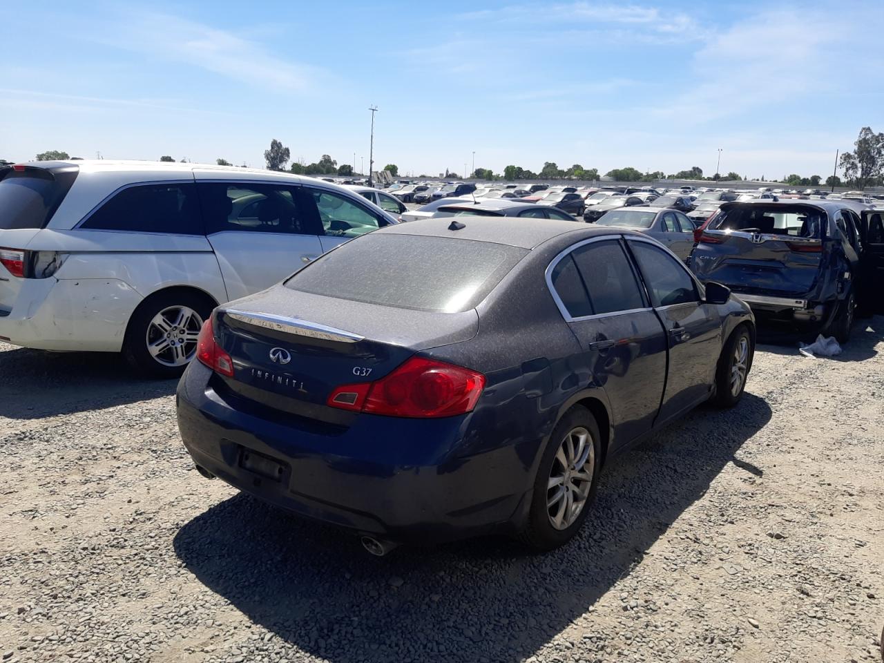 Photo 4 from auction – 2009 INFINITI G37 BASE with VIN JNKCV61E19M010259