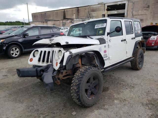 Photo 2 from auction – 2011 JEEP WRANGLER U with VIN 1J4BA3H18BL568027