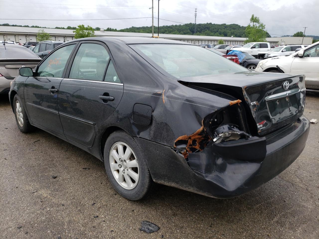 Photo 15 from auction – 2004 TOYOTA CAMRY LE with VIN 4T1BF32K74U063596