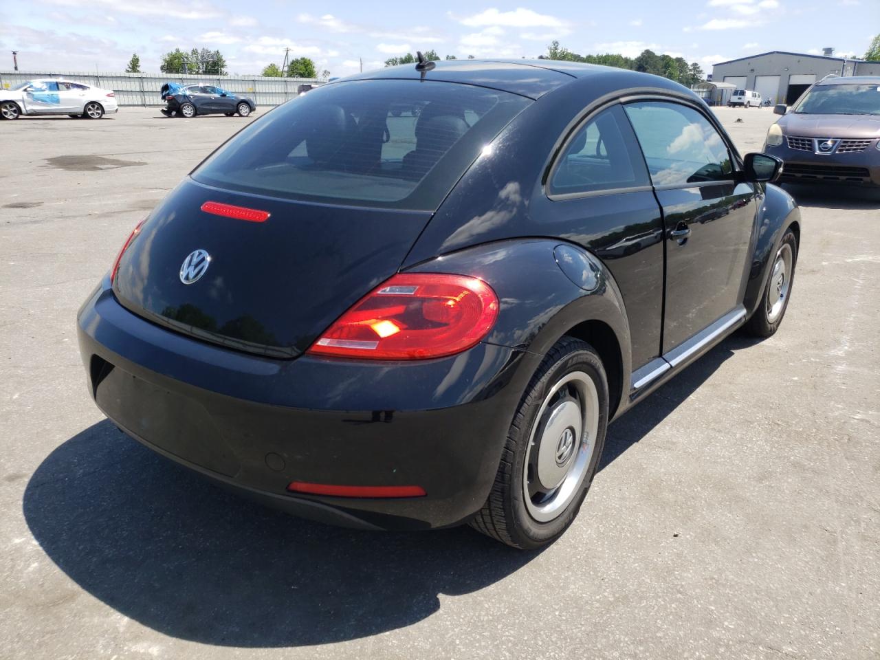 Photo 4 from auction – 2013 VOLKSWAGEN BEETLE with VIN 3VWJP7AT3DM618883