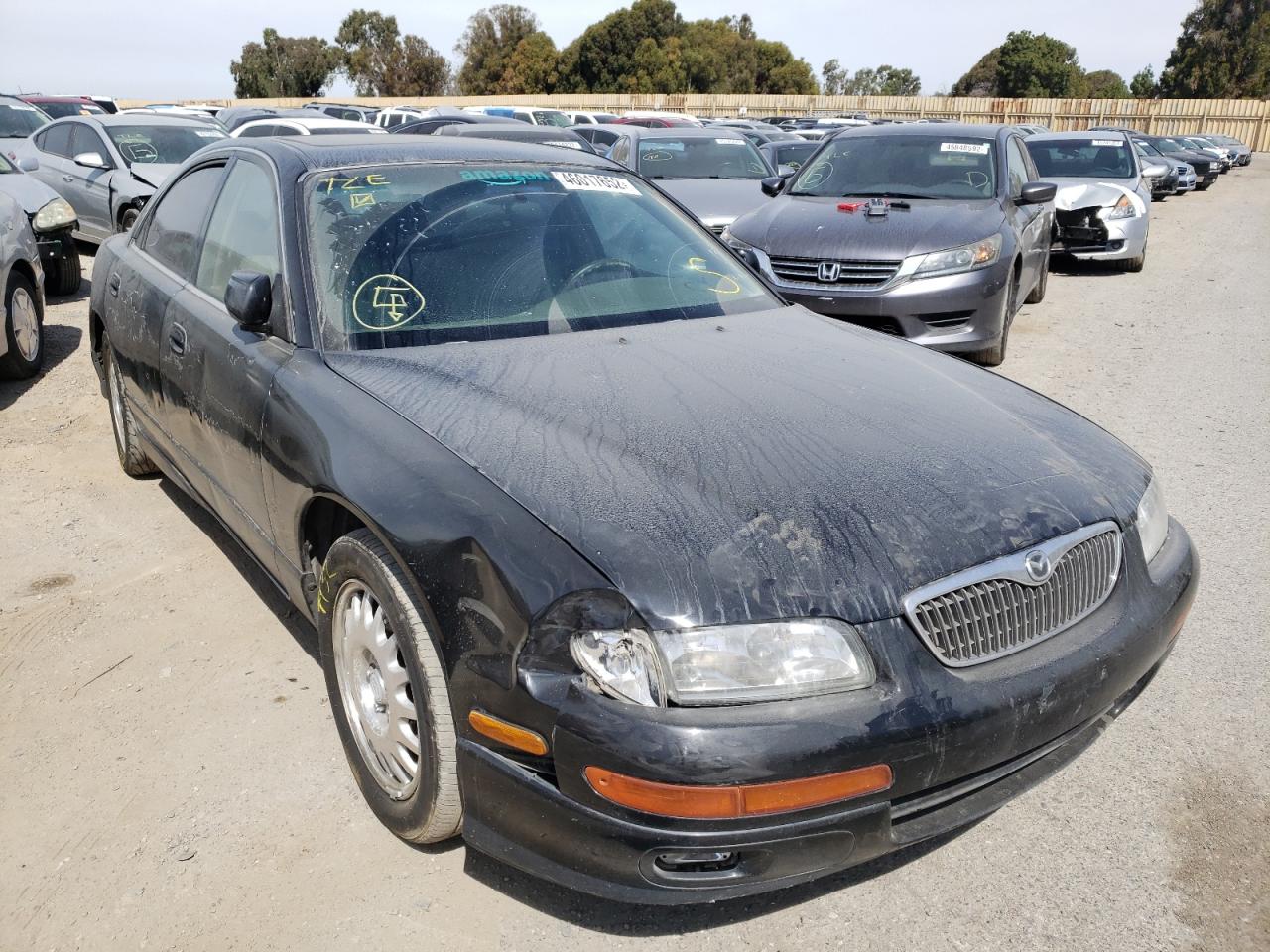 MAZDA MILLENIA 1998 with VIN JM1TA2215W1414759 - Photo from auction