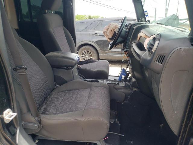 Photo 5 from auction – 2011 JEEP WRANGLER U with VIN 1J4BA3H11BL542398