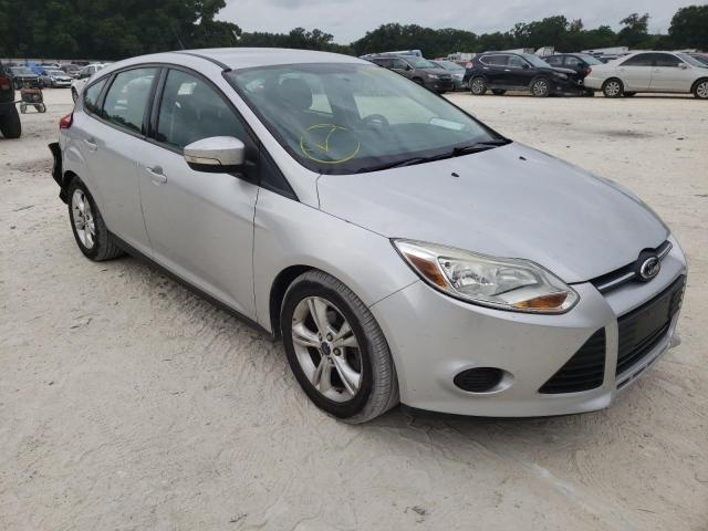 FORD FOCUS SE 2014 with VIN 1FADP3K21EL323840 - Photo from auction