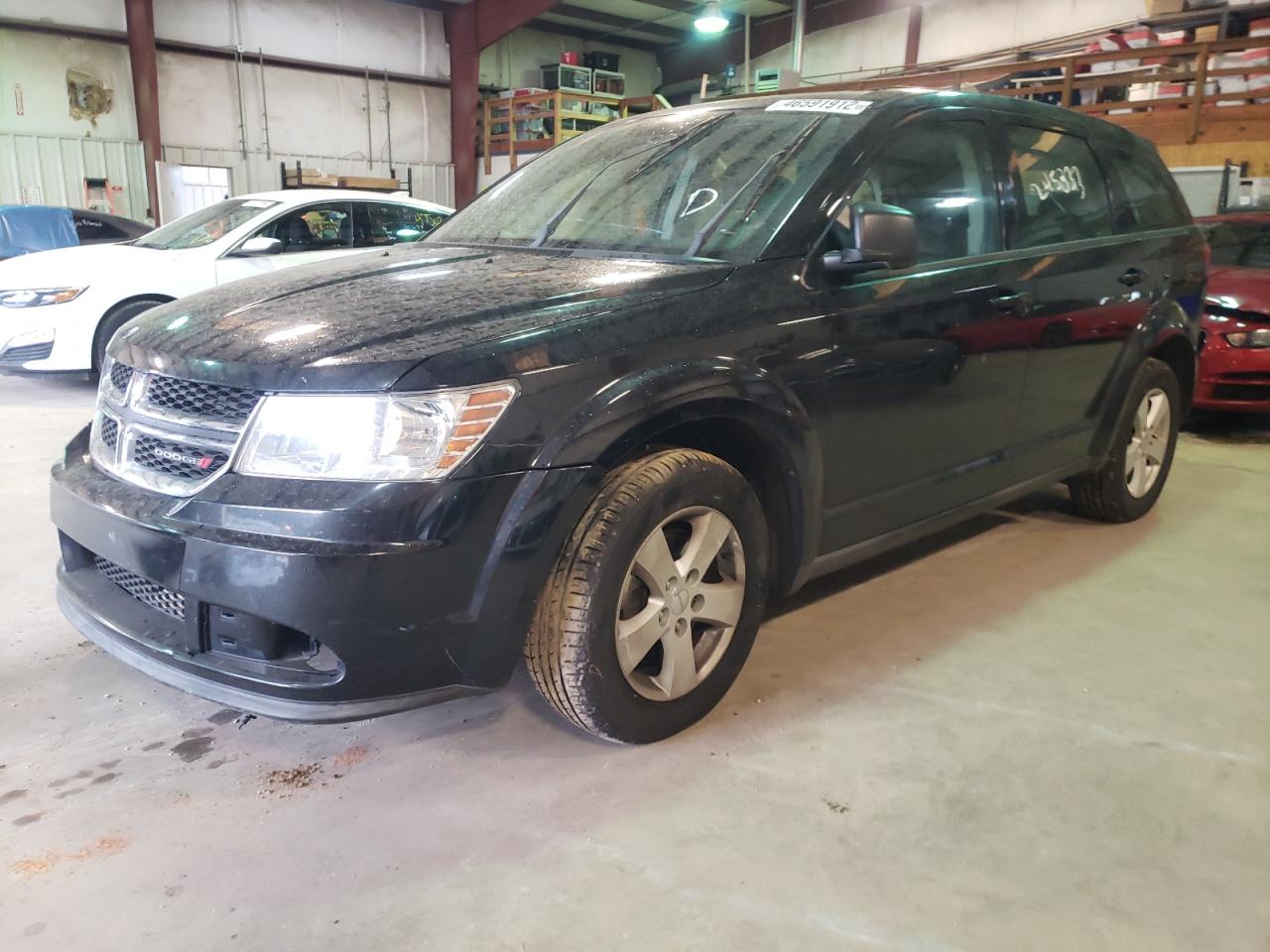 Photo 2 from auction – 2013 DODGE JOURNEY SE with VIN 3C4PDCAB7DT650232
