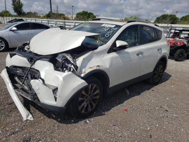 Photo 2 from auction – 2018 TOYOTA RAV4 LIMIT with VIN JTMYFREV4JD120369