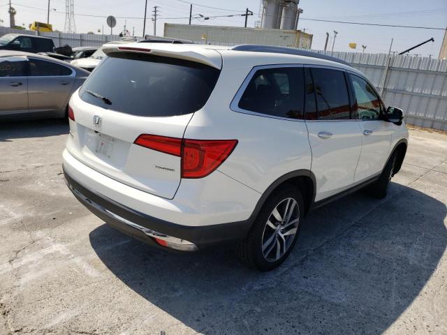 Photo 4 from auction – 2017 HONDA PILOT TOUR with VIN 5FNYF5H9XHB033649