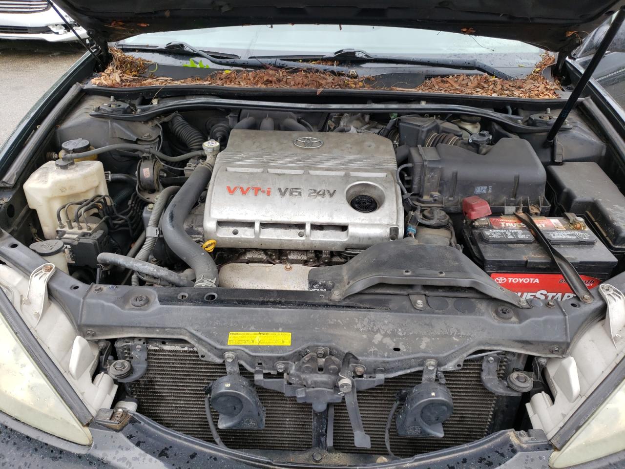 Photo 11 from auction – 2004 TOYOTA CAMRY LE with VIN 4T1BF32K74U063596