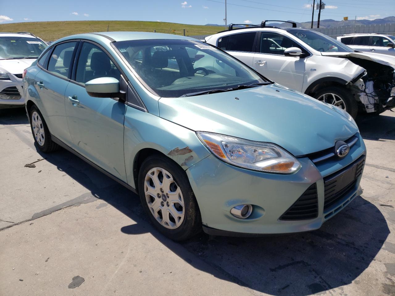 FORD FOCUS SE 2012 with VIN 1FAHP3F28CL385695 - Photo from auction