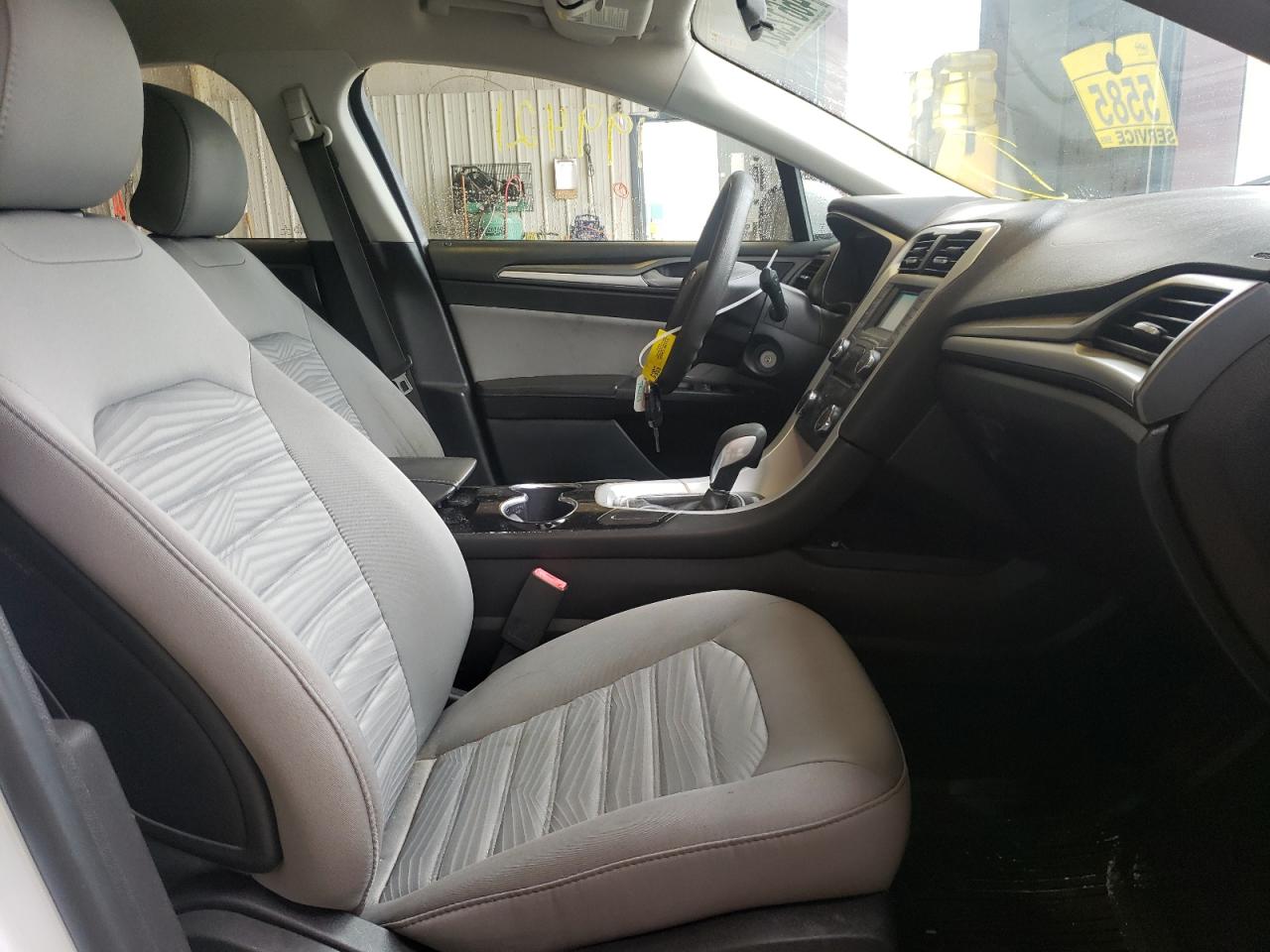 Photo 18 from auction – 2016 FORD FUSION S with VIN 3FA6P0G70GR296355