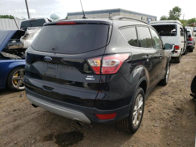 Photo 4 from auction – 2018 FORD ESCAPE SEL with VIN 1FMCU9HD0JUC25005
