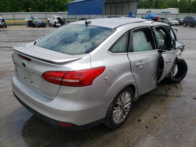 Photo 4 from auction – 2015 FORD FOCUS TITA with VIN 1FADP3J21FL348711
