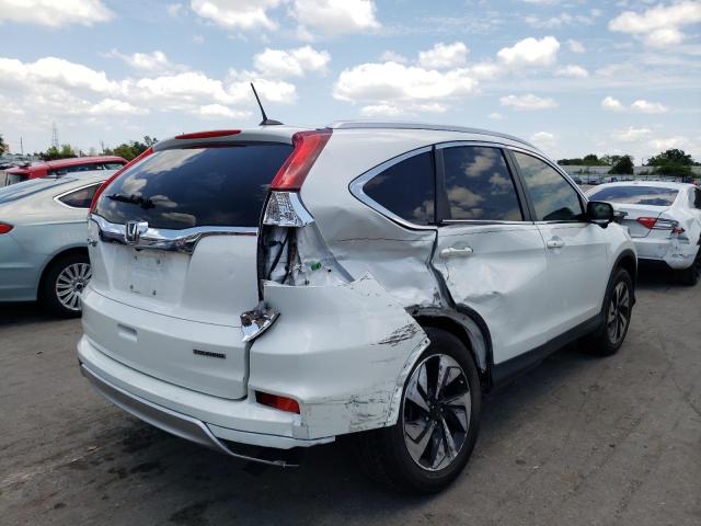 Photo 4 from auction – 2016 HONDA CR-V TOURI with VIN 5J6RM3H90GL009610