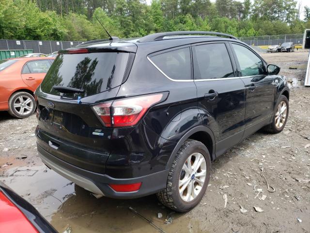 Photo 4 from auction – 2018 FORD ESCAPE SE with VIN 1FMCU9GD3JUC29762