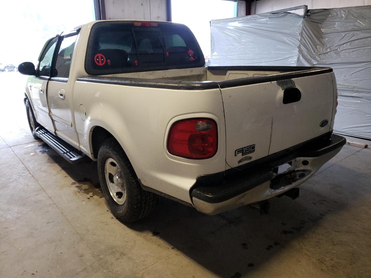 Photo 3 from auction – 2003 FORD F150 SUPER with VIN 1FTRW07673KB70638