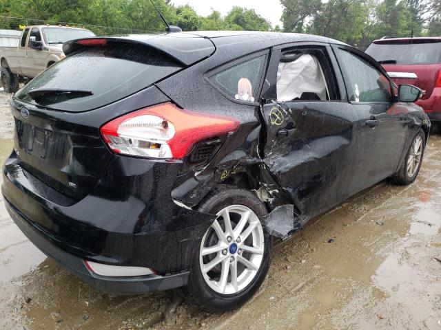 Foto 4 de la subasta – 2017 FORD FOCUS SE con VIN 1FADP3K23HL208046