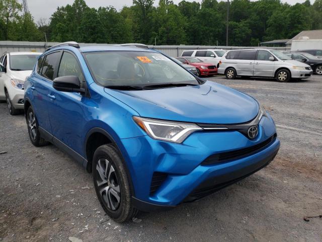 TOYOTA RAV4 LE 2017 with VIN JTMZFREV7HJ706628 - Photo from auction