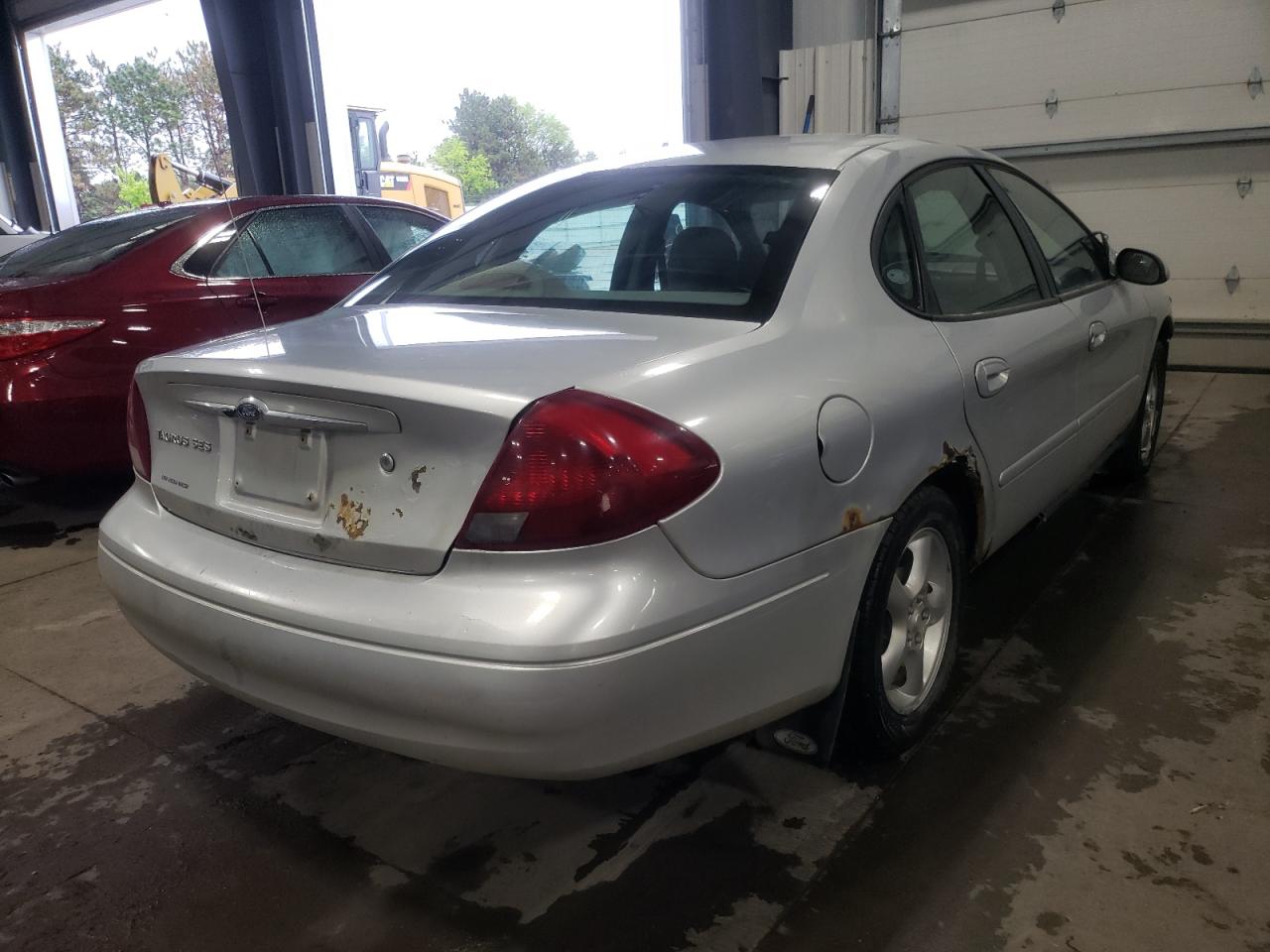Photo 16 from auction – 2001 FORD TAURUS SES with VIN 1FAFP55U21G267010