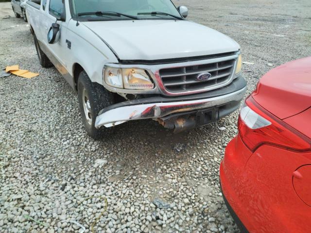Photo 9 from auction – 2001 FORD F150 with VIN 1FTRX17W61KF06439