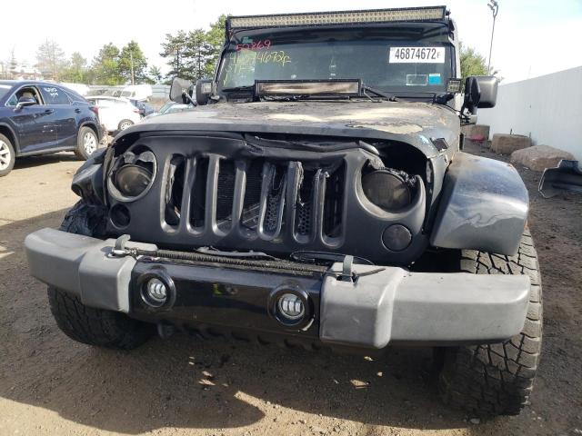 Photo 9 from auction – 2010 JEEP WRANGLER U with VIN 1J4BA5H15AL182935