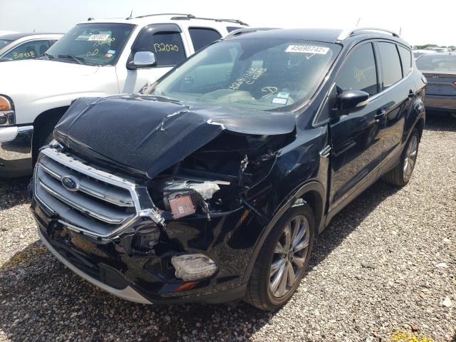 Photo 2 from auction – 2017 FORD ESCAPE TIT with VIN 1FMCU0JD0HUC75693