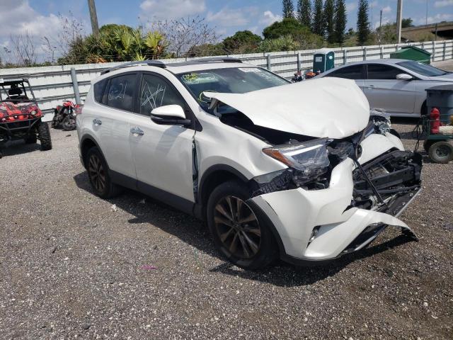 TOYOTA RAV4 LIMIT 2018 with VIN JTMYFREV4JD120369 - Photo from auction