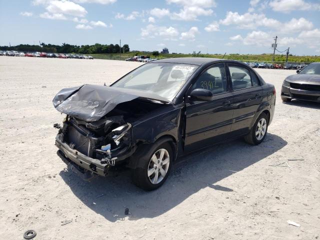 Photo 2 from auction – 2011 KIA RIO BASE with VIN KNADH4A37B6937032